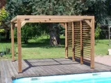 HABRITA - Pergola thermauvent en bois avec vantelles mobiles sur mur