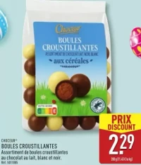 BOULES CROUSTILLANTES Assortiment de boules croustillantes au chocolat au lait, blanc et noir.