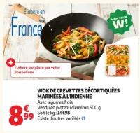 Wok de crevettes décortiquées marinées à l'indienne
